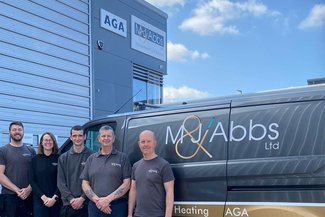 Team outside with van